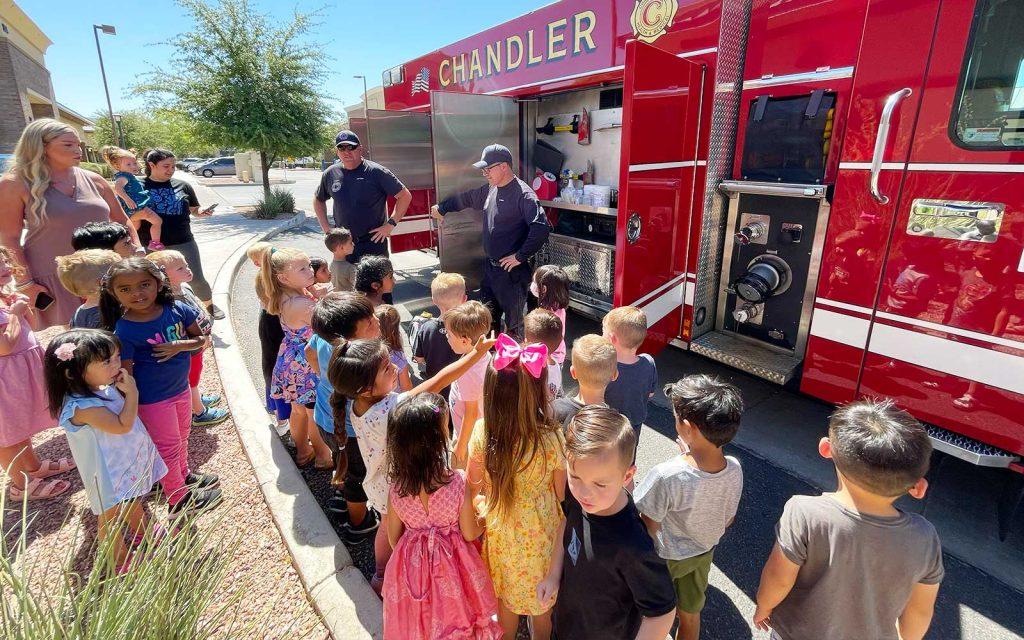 firefighters educating the students of carebear preschool